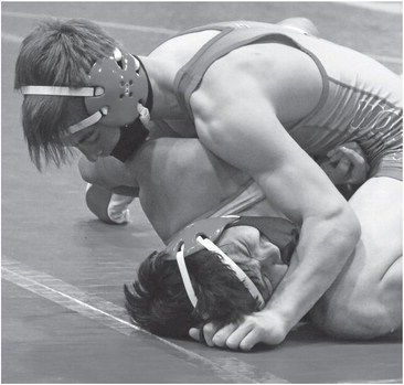 Wrestling co-op collects first win by pinning Red Raiders