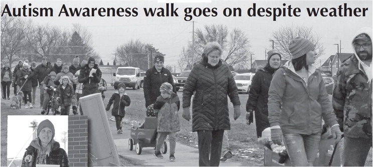 Autism Awareness walk goes on despite weather