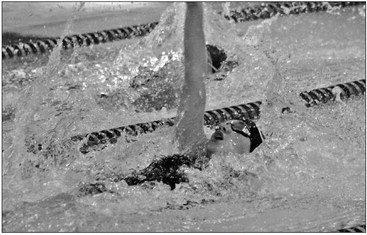 Swim co-op sets 22 PRs at conference meet