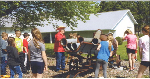 Heritage Days show youth farming equipment of old