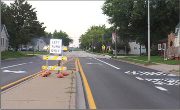 Village of Spencer requests  DoT change lane configuration  near 98/13 intersection