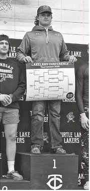 Angell, Madlon pin down titles at Lakeland Conference meet