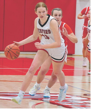 Girls shoot down Rapids in OT thriller; 33-0 run decks Antigo